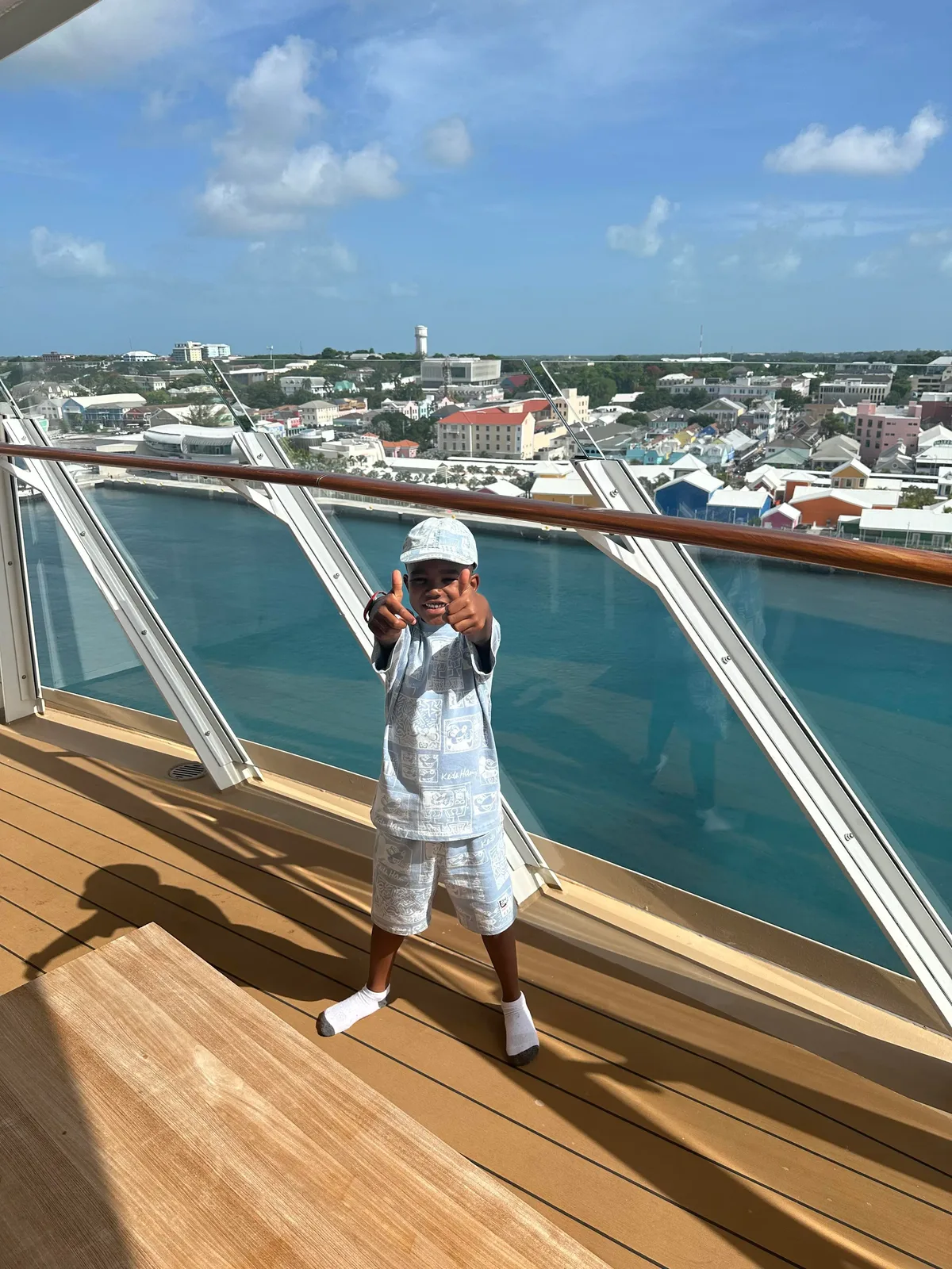 Traveler on the deck of a ship in bright ocean light